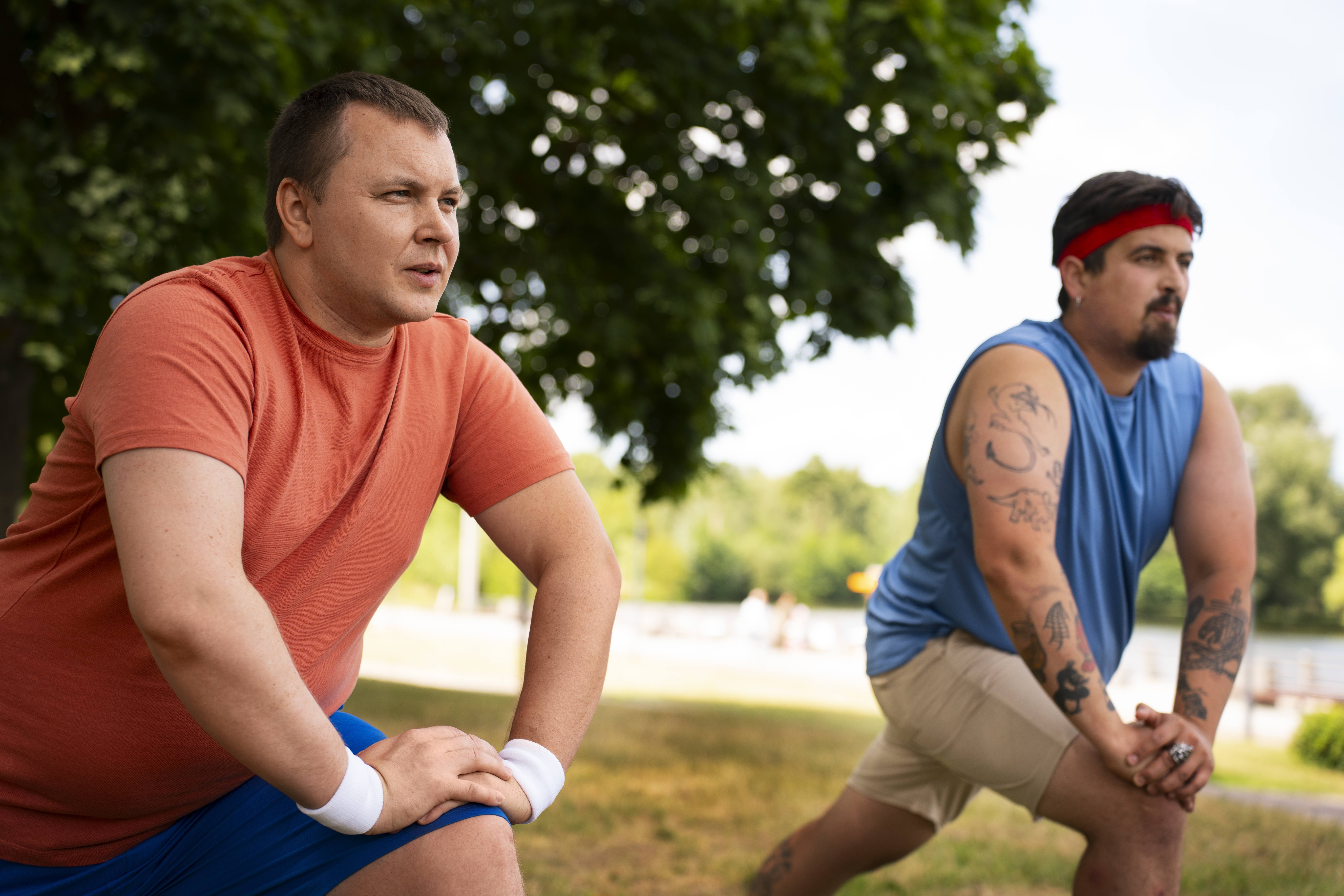 side-view-men-exercising-together-outdoors